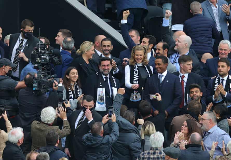 Yasir al-Rumayyan, the chairman of Newcastle, and Amanda Staveley, a part-owner, look on from the stands.