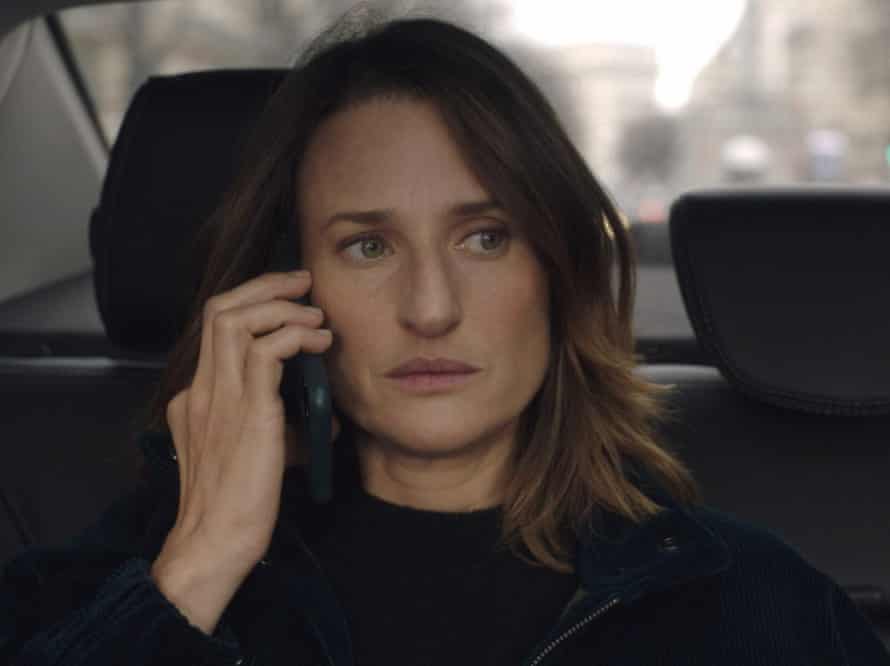Camille Cottin in Call My Agent, on phone in a car
