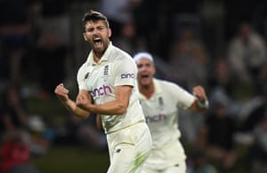 Mark Wood of England celebrates the wicket of Cameron Green of Australia.