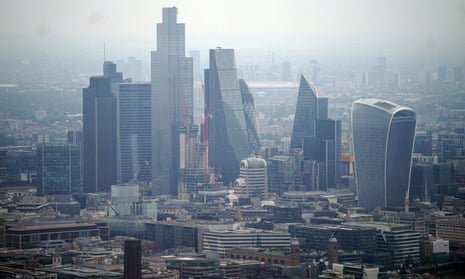 An aerial view of the City of London skyline.