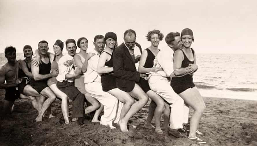 Members of the England and Australia teams and their partners enjoy a day at the beach in Queensland.