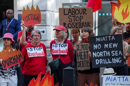 Protesters hold up signs saying ‘Stop Rosebank’ and ‘Miatta, no new North Sea drilling’
