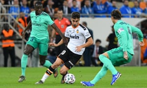 Ferran Torres attempts to get the better of Real Madrid’s Sergio Ramos (right) and Ferland Mendy during Valencia’s Spanish Super Cup semi-final in January 2020.