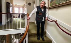 Margaret Payne on the stairs of her home in Ardvar, Sutherland