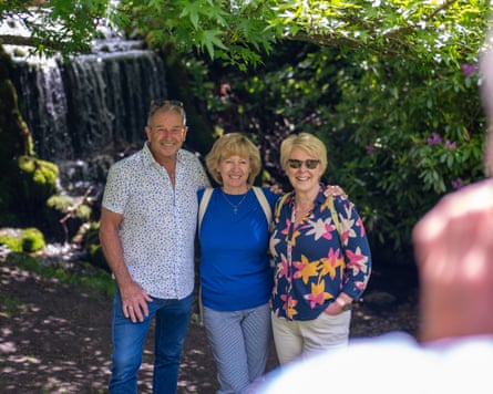 People pose for a photo on their last pilgrimage to Bridehead Estate lake and waterfall.