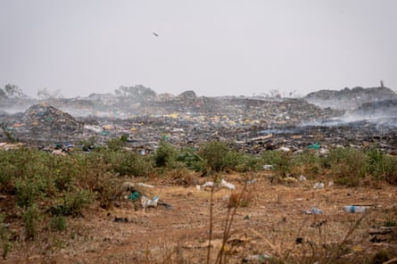 The large rubbish dump with steam coming off it