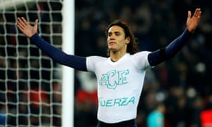 Paris Saint-Germain’s Edinson Cavani shows his support for the stricken Brazilian club Chapecoense after scoring a penalty in the 2-0 win over Angers.