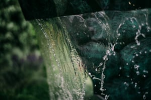 close-up on falling water in a water feature