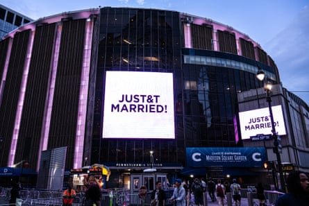 Video billboards at Madison Square Garden read “JUST&T MARRIED!”