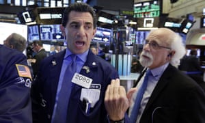 Traders on the floor of the New York Stock Exchange