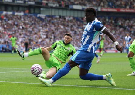Jorge Cuenca tries to stop the impressive Carlos Baleba as Brighton attack.