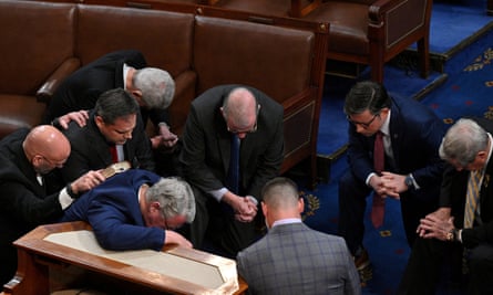 group of white men kneeling
