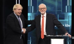 Boris Johnson and Jeremy Corbyn shake hands during their ITV election debate.
