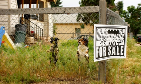 Property not for sale sign and dogs. Denver gentrification story for cities
