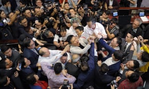 Scuffles in the chamber of the legislative assembly in Hong Kong