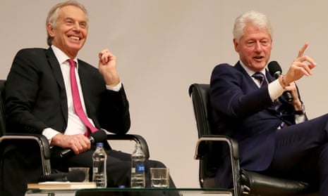 Tony Blair and Bill Clinton on stage in Belfast.