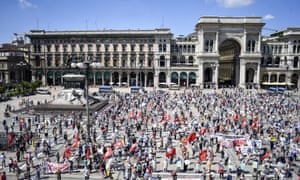 People gather to stage a protest against the Lombardy regional government in downtown Milan, Italy, on Saturday, 20 June, 2020.