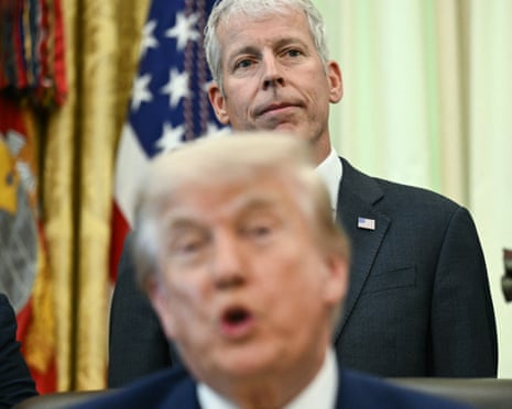 Energy secretary Chris Wright looks on as Donald Trump speaks during an announcement about coal in the Oval Office.