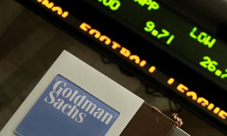 Goldman Sachs logo besides a stock market ticker