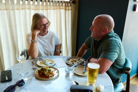 Steph and Stephen chat across a restaurant table