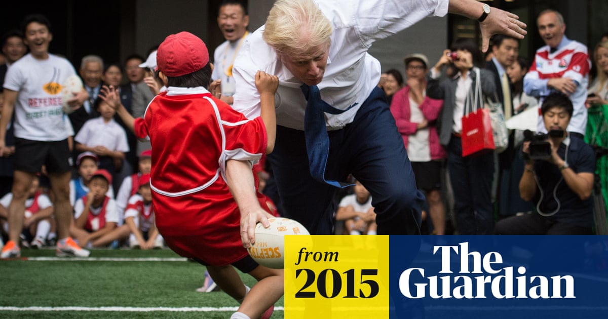 Boris Johnson Knocks Over 10 Year Old During Rugby Game In Japan Politics The Guardian