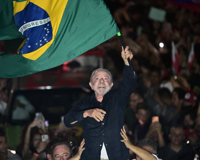 ‘We can’t let the far right take power again’: Lula voters in final push before Brazil runoff
