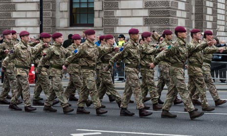 Military personnel march in London