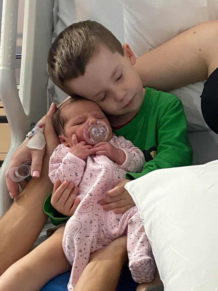 Megan Snaidero’s son Ben with her newborn daughter Elliana