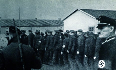 Prisoners enter Dachau concentration camp in 1933.