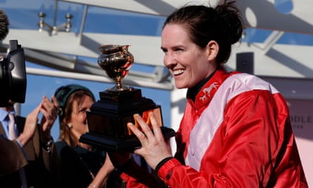 Rachael Blackmore shows off the famous trophy after victory on A Plus Tard in the Gold Cup.