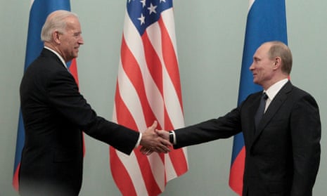Joe Biden, then the US vice-president, shakes hands with Vladimir Putin during their meeting in Moscow in March 2011.