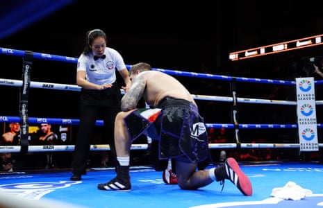 Amy Pu counts over Dan Garber at the O2 Arena