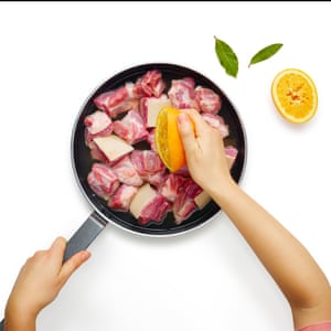 Put pork cubes (skin left on) in a large, heavy pan in a single layer, then add salt, orange juice and a bay leaf or two ...