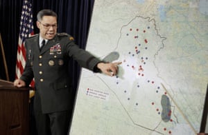 Powell points to Iraqi airbases at a Pentagon briefing in Washington in 1991