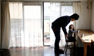 Minimalist Naoki Numahata talks to his two-and-a-half year old daughter Ei in their living-room in Tokyo.