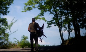 A man carries a chair purchased from an estate sale in Bethlehem.