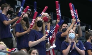 USA swimmers cheer on their teammates at the 2020 Tokyo Olympics