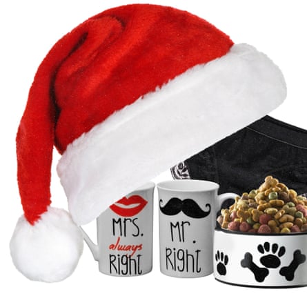 A Secret Santa hat and two mugs and a bowl of dog food