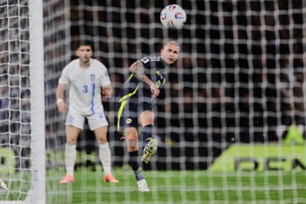 Lyndon Dykes slots home Scotland’s final goal in their 3-1 win over Greece.