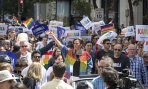 Presidential candidate Kamala Harris and her husband Douglas Emhoff attend 2019's Pride Parade in San Francisco