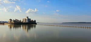 Weston-super-Mare, UK ‘Back at the beginning of the month, the tidal range was quite high and here at the marine pool the built-up causeway creates a bridge that is used as a shortcut, but in another hour, the incoming tide will start to flow over this man-made dam and into the pool and will eventually start to cover the safety railings.’