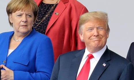 BELGIUM-NATO-DEFENCE-POLITICS-SUMMIT<br>(LtoR) German Chancellor Angela Merkel, US President Donald Trump and Greek Prime Minister Alexis Tsipras pose for a family picture ahead of the opening ceremony of the NATO (North Atlantic Treaty Organization) summit, at the NATO headquarters in Brussels, on July 11, 2018.   / AFP PHOTO / POOL / LUDOVIC MARINLUDOVIC MARIN/AFP/Getty Images