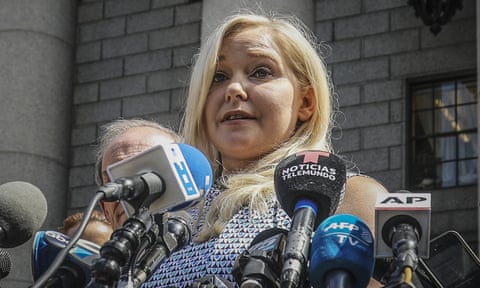 Virginia Giuffre holds a news conference outside a New York court in 2019