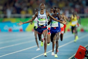 Mo Farah of Great Britain celebrates victory as he crosses the line in the men’s 5,000m during day fifteen of the 2016 Olympics in Rio de Janiero