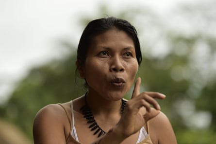 Indigenous woman of the Amazon wags a finger to camera