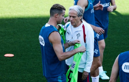 PortugalâÂÂs head coach Jorge Jesus speaks with player Cristiano Ronaldo (L) during a training session ahead of the Nations League match against Wales
