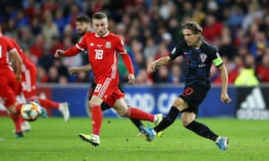 Joe Morrell challenges Croatia’s Luka Modric during a Euro 2020 qualifier at Cardiff City Stadium in October.