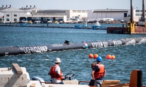 The 600m-long floating barrier, known as System 001