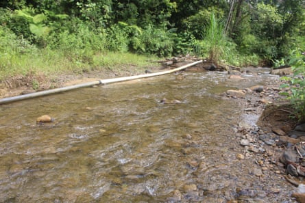 A shallow stretch of river near the North Sumatran village of Bongkaras, which has been affected by construction of a new zinc mine.