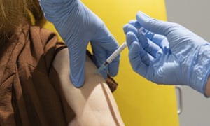 A patient's arm is injected
